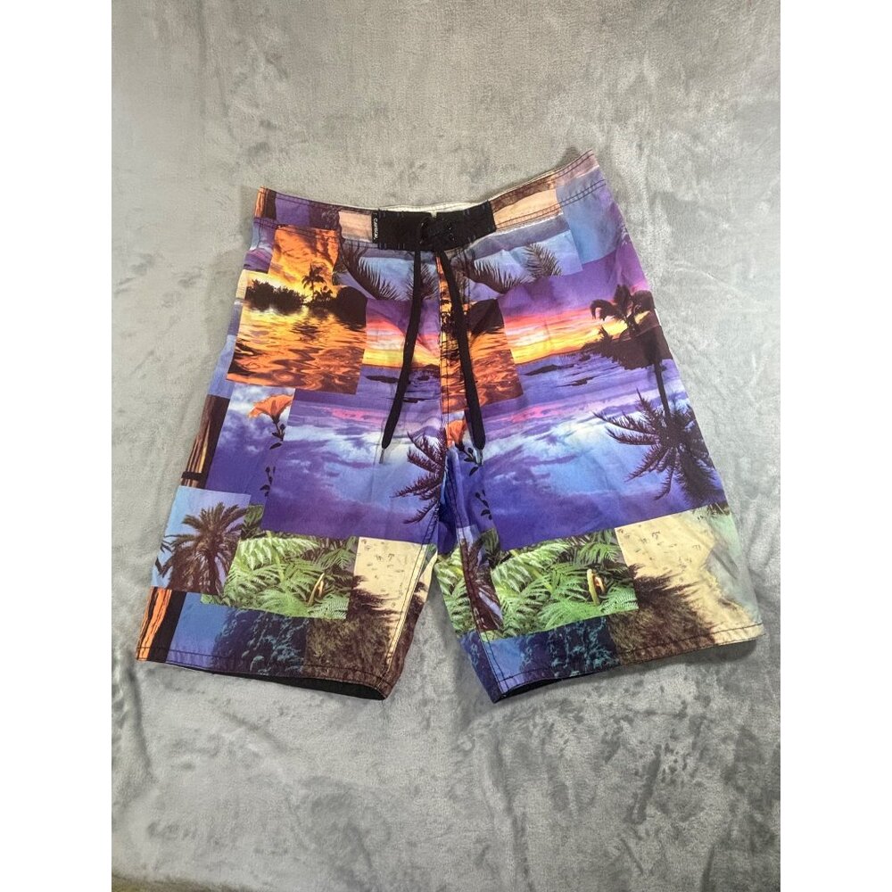 Carbon swimming trunks men's 36 multi color and a collage of pictures